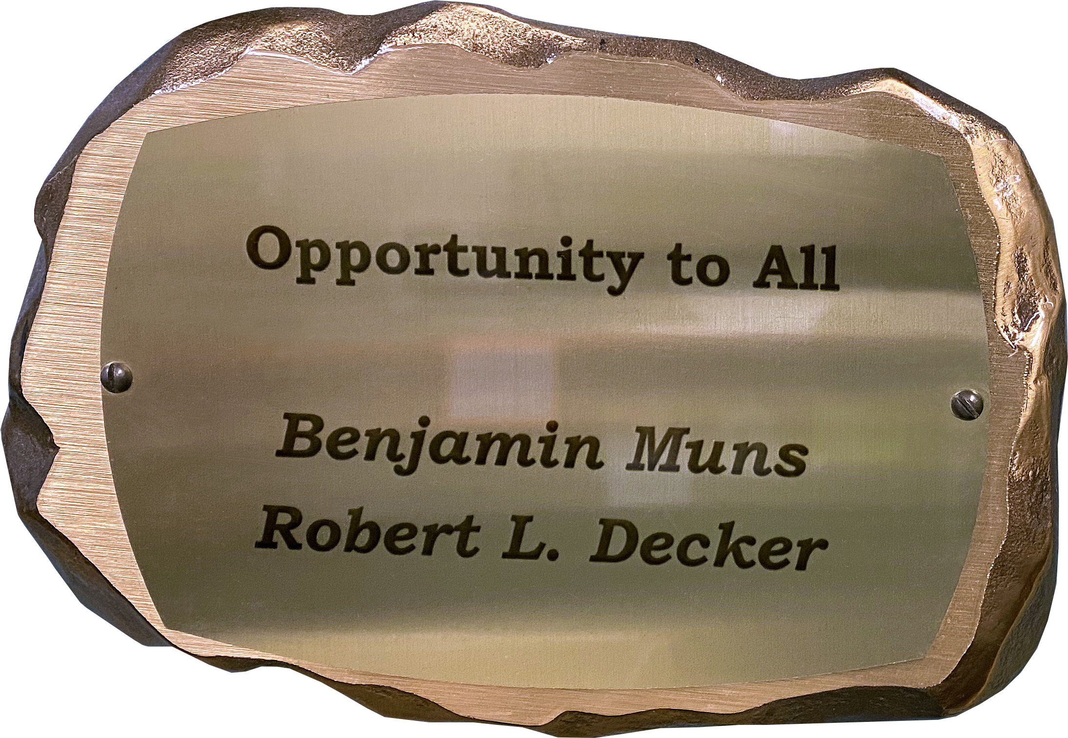Inscribed bronze plaque in the shape of a rock with text on it reading: Opportunity to All. Benjamin Muns. Robert L. Decker