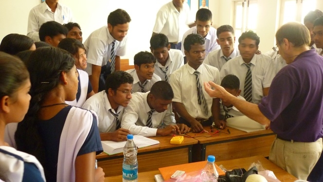 High school students learn from the RCPD about digital electronics and assistive technology in India.