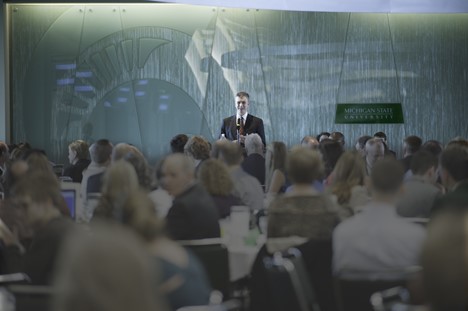 Michael Hudson speaking at past awards reception