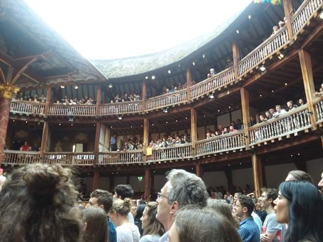 Photo of the Globe Theater in London, a view from a seat on the floor looking around at the walls