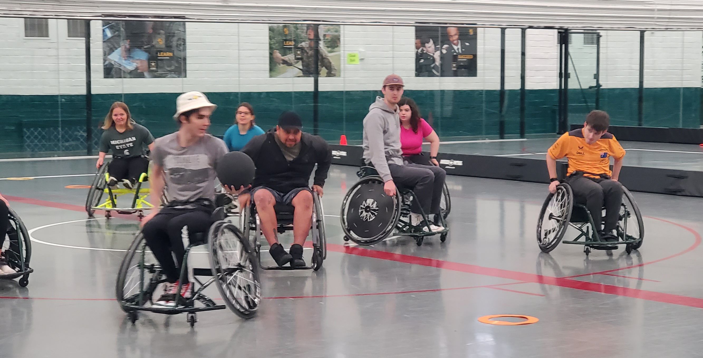 photo of adaptive sports day participants playing trashketball
