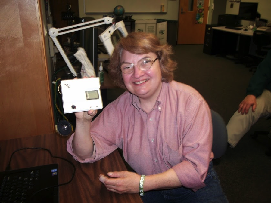 A blind user demonstrates an accessible insulin pump.