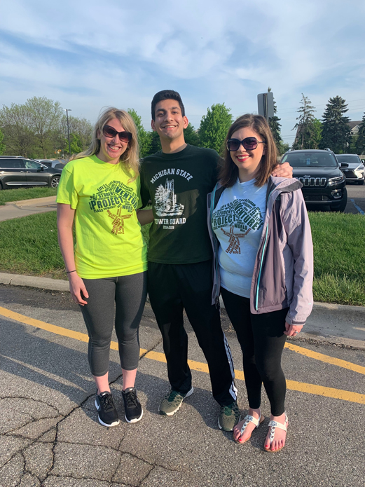 Leslie Johnson and Ashley Maloff and Zaakir Hamzavi at race day