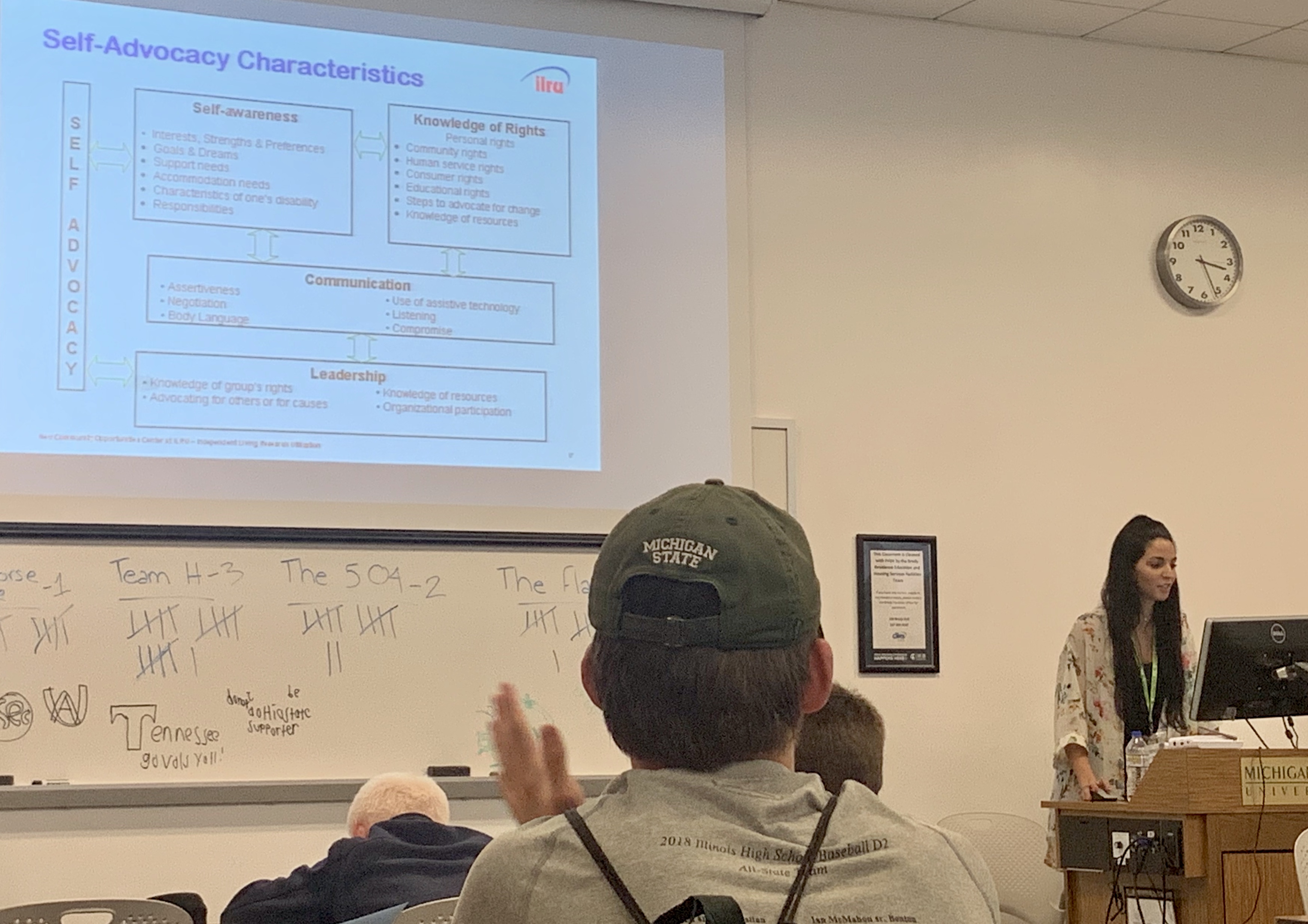 Students listening to a lecture during mock college classes.