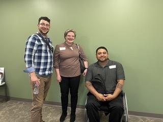 Image of Tyler Smeltekop (wearing a blue and white checkered button up), Tanya Adams (wearing a light brown shirt), and Robert Briseno (wearing a dark gray golf shirt). 