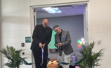 Anthony Ianni and Freddi Bello cur the ribbon at the sensory room dedication ceremony