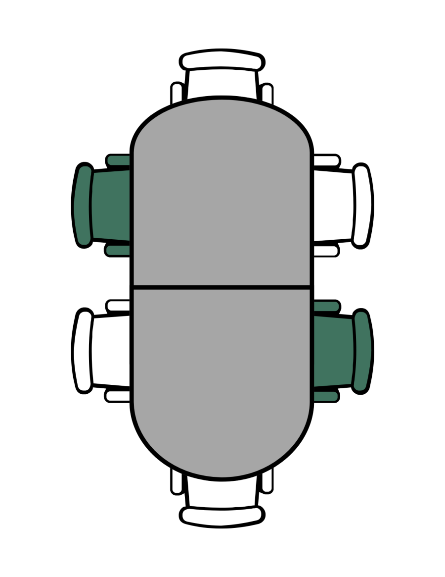 Rounded table with six seats, one at each end and two on the sides. One seat is green on each side.