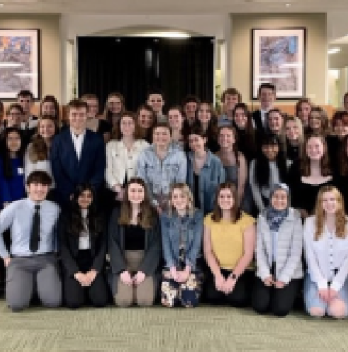 A group of 80 freshmen MSU students meet in the MSU Union main floor and smile at the camera marking their first time as Tower Guard 2022-2023.